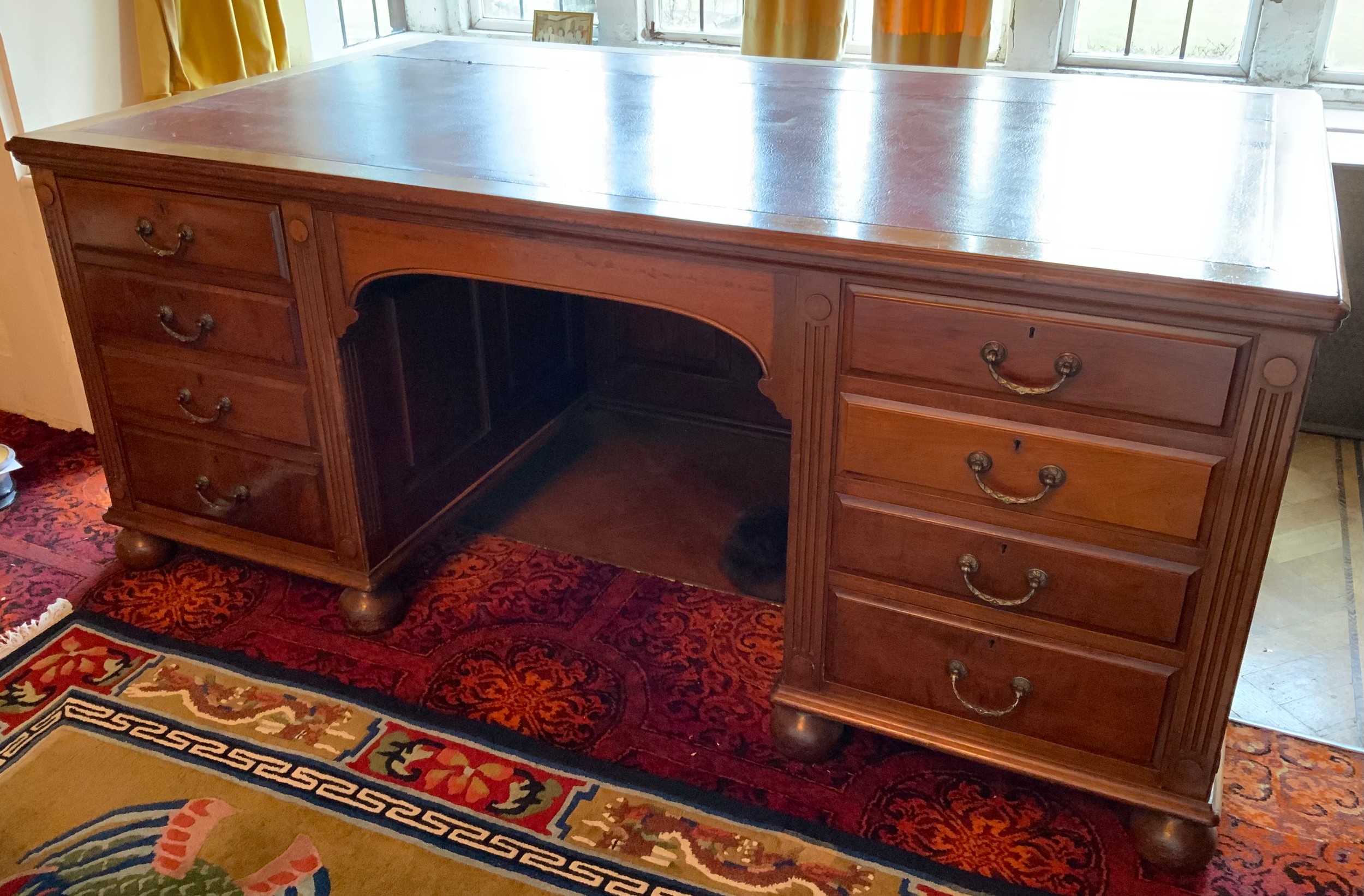 A late 19th/early 20th century mahogany partners desk, tooled leather writing surface, central - Image 2 of 4