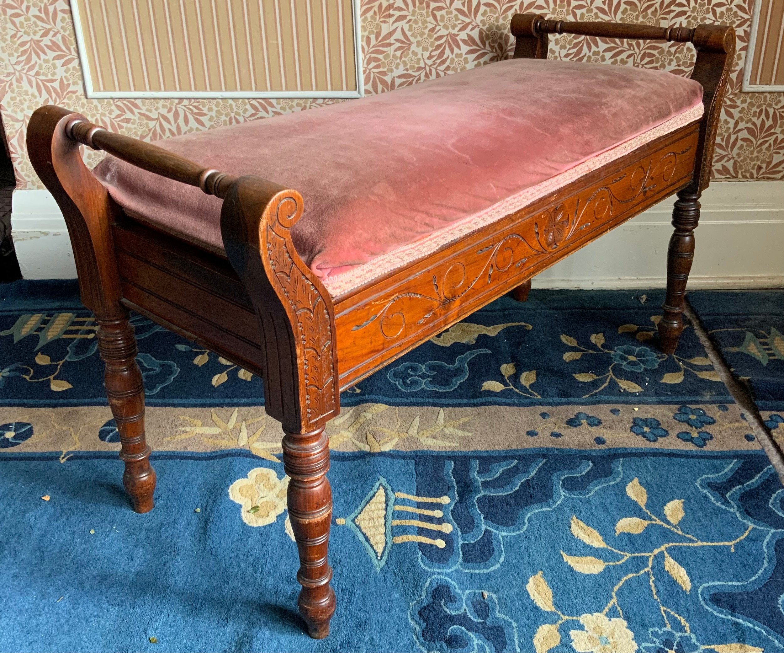 A Victorian mahogany duet piano stool, stuffed over top, turned legs, 50cm high, 82cm wide, c.