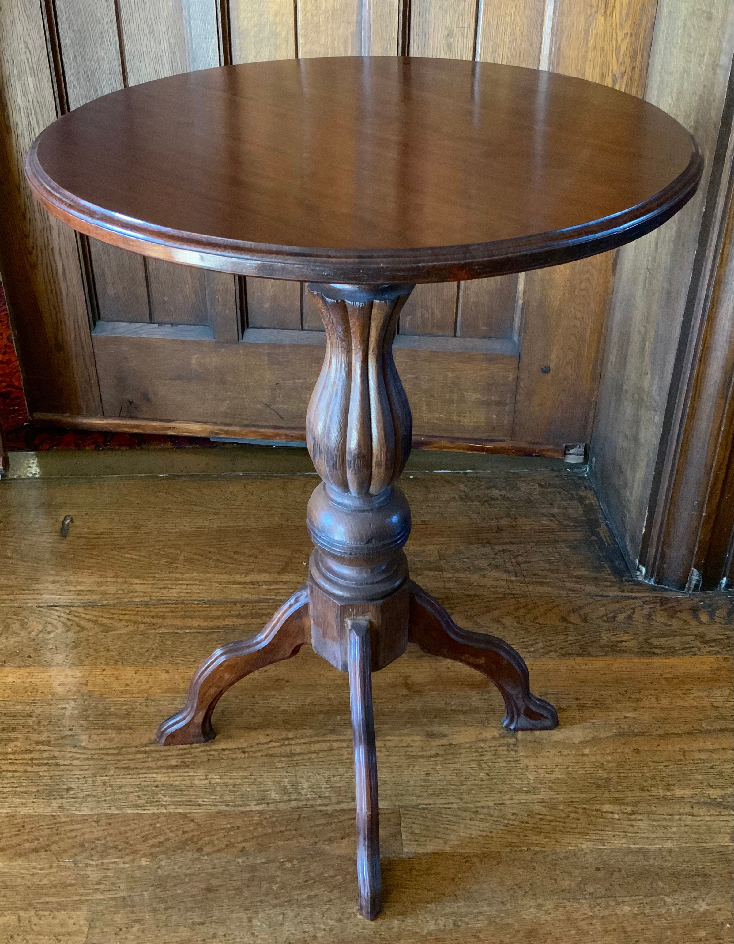 A 19th century mahogany occasional table, circular top, lobed baluster columns, four shaped legs,