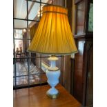 A late 19th century opaque glass side light, of panelled baluster form, gilt metal mounts, 49cm