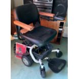 A Travelux Quest Mid Wheel mobility chair ** We would please ask that all payments are made by