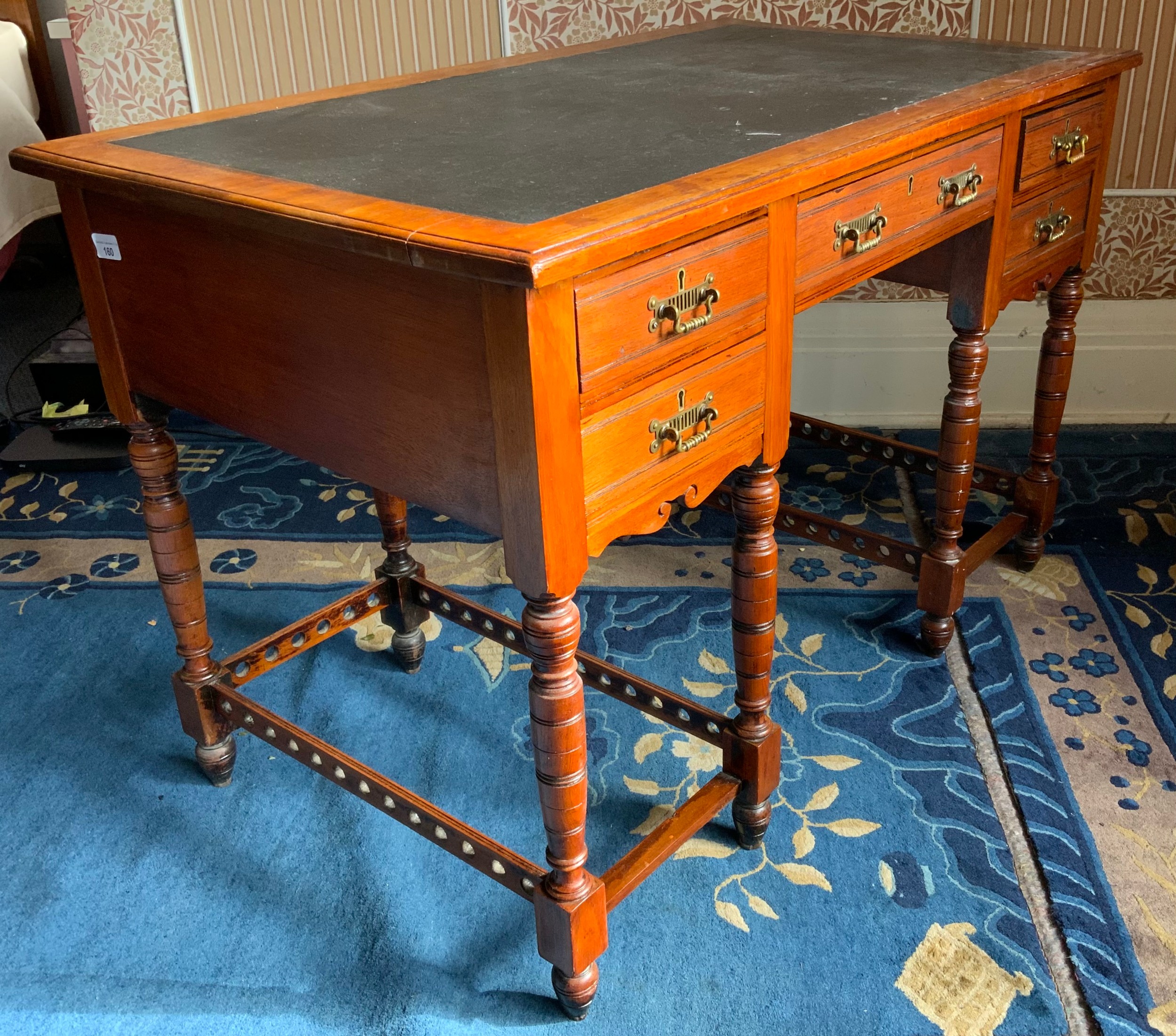 A Victorian mahogany writing desk, with inset writing surface above an arrangement of five - Image 2 of 2