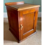 A 19th century mahogany bedside cabinet, fielded panelled door, enclosing two shelves, 66cm high,