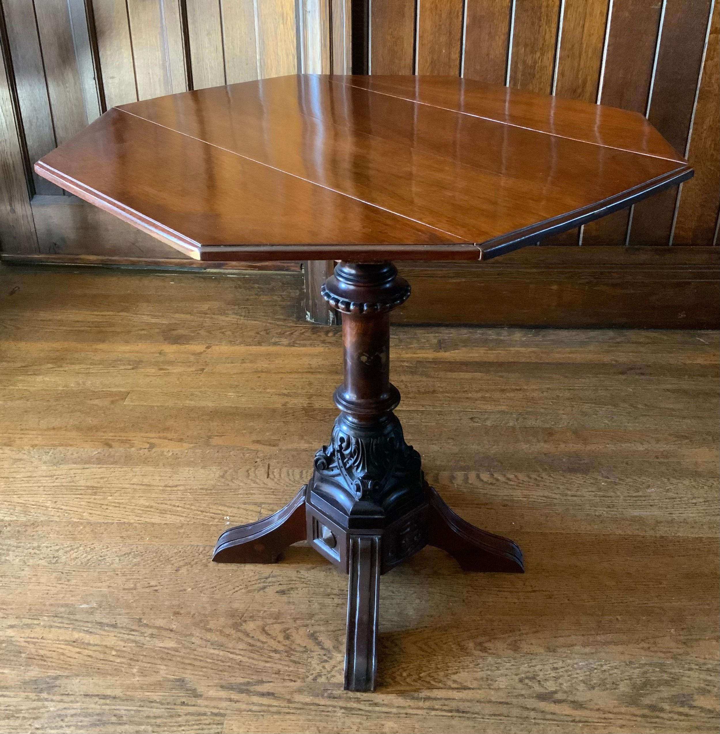 A 'Victorian' mahogany octagonal drop leaf occasional table, carved columns, four splay legs, 70cm