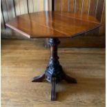 A 'Victorian' mahogany octagonal drop leaf occasional table, carved columns, four splay legs, 70cm