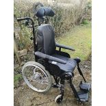 An Invacare Rea Azalea wheel chair and attachments. ** We would please ask that all payments are