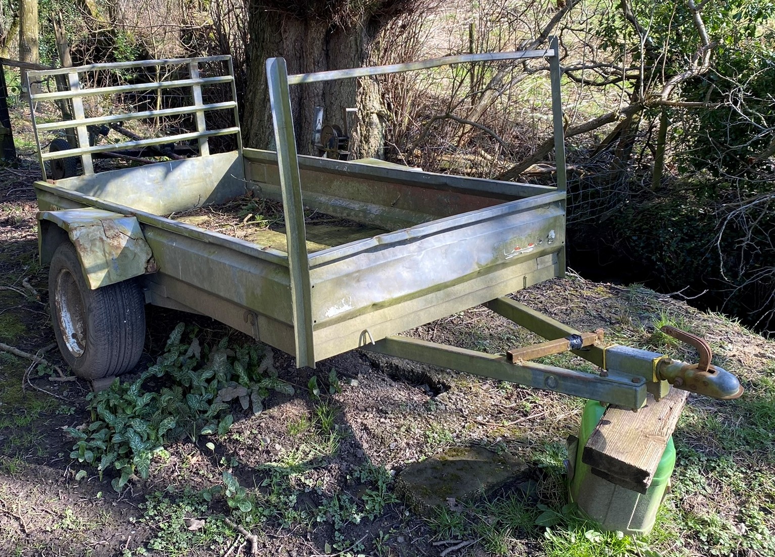 Salvage - A galvanized two wheel flat bed trailer, 232 x 124cm load size. ** We would please ask