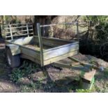 Salvage - A galvanized two wheel flat bed trailer, 232 x 124cm load size. ** We would please ask