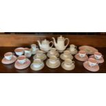 A Paragon Belinda pattern tea and coffee service, comprising six teacups and saucers, side plates,
