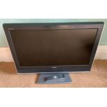 A Toshiba 31in LCD colour TV and control, model no. 32WLT66s ** We would please ask that all