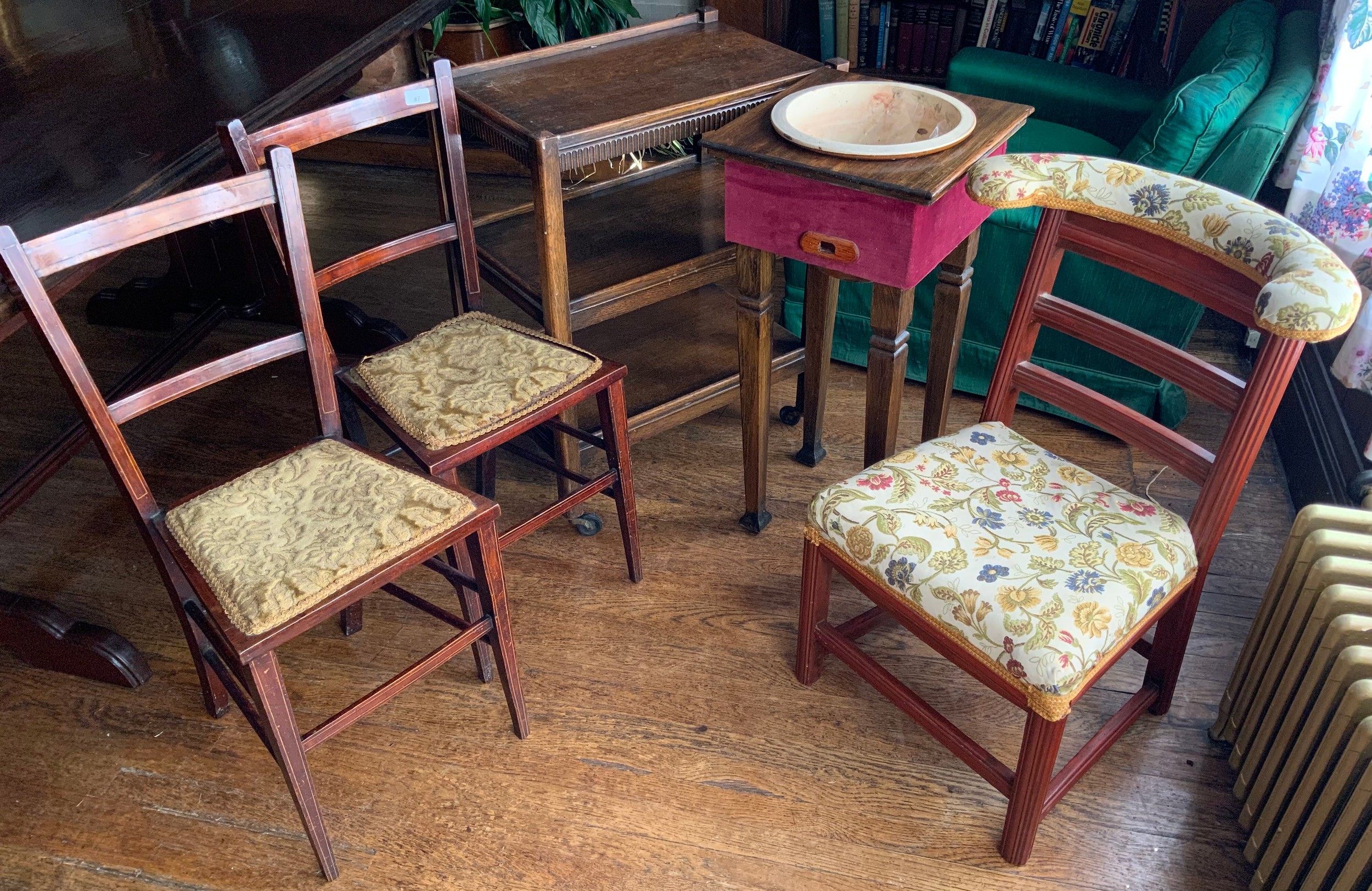 A pair Edwardian bedroom chairs; another; an oak trolley; another; a jardiniere stand ** We would