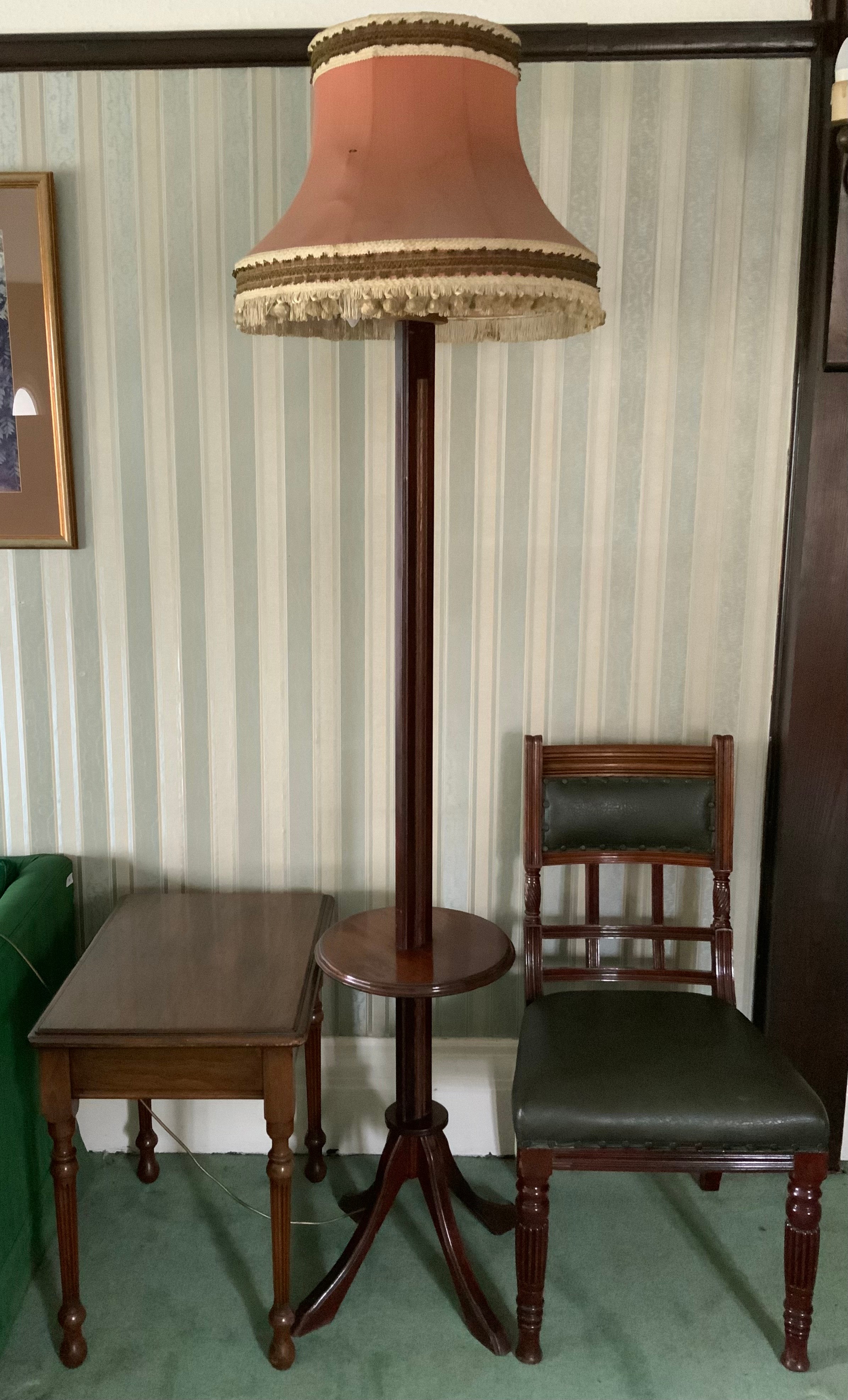 A mahogany standard lamp, with shelf, four sabre legs; a mahogany side table; a Victorian mahogany
