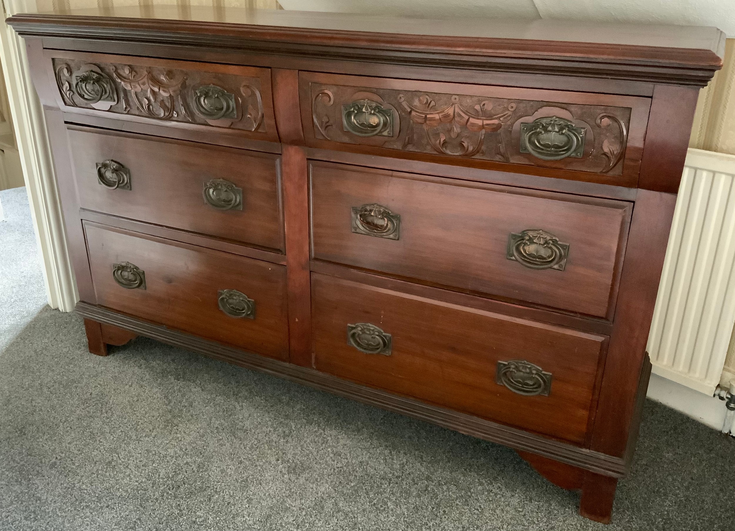 An early 20th century mahogany sidebaord, with six drawers, carved with swags, Art Nouveau - Image 2 of 2