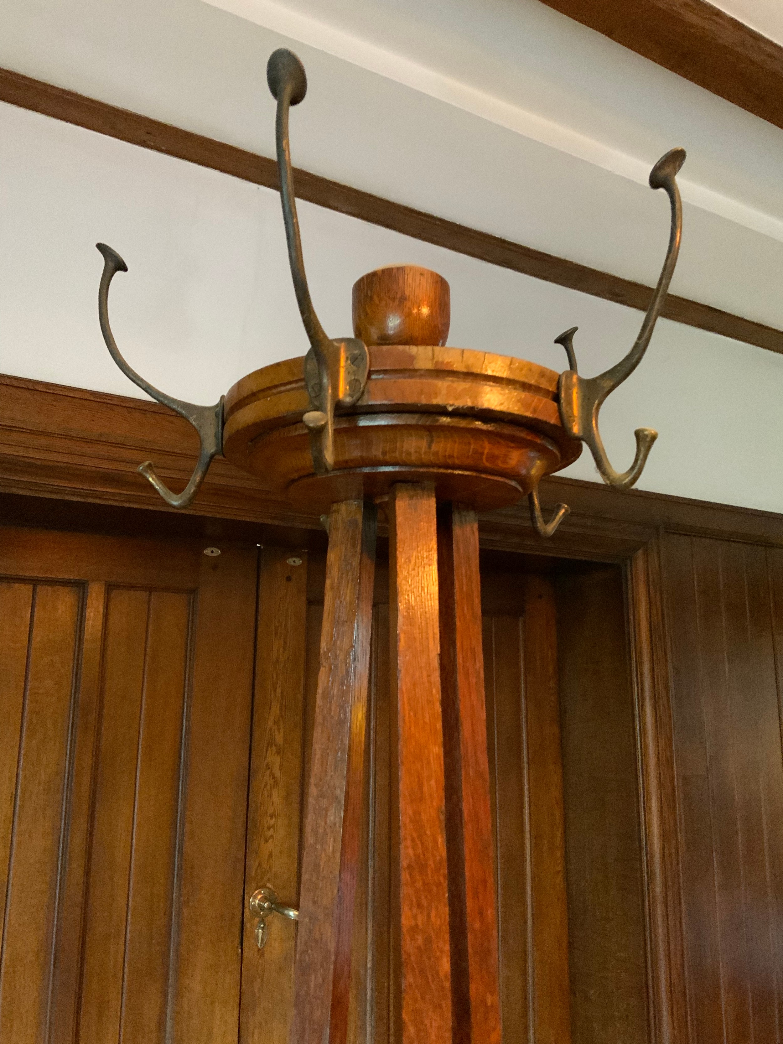 An early 20th century oak coat, hat and umbrella stand, turned finials, three splayed legs ** We - Image 3 of 4