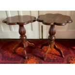 A pair of 20th century mahogany occasional tables, shaped circular tops, fluted bulbous columns,