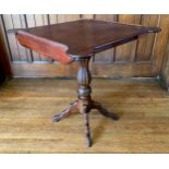 A 19th century mahogany side table, shaped top, associated fluted baluster column, four shaped legs,