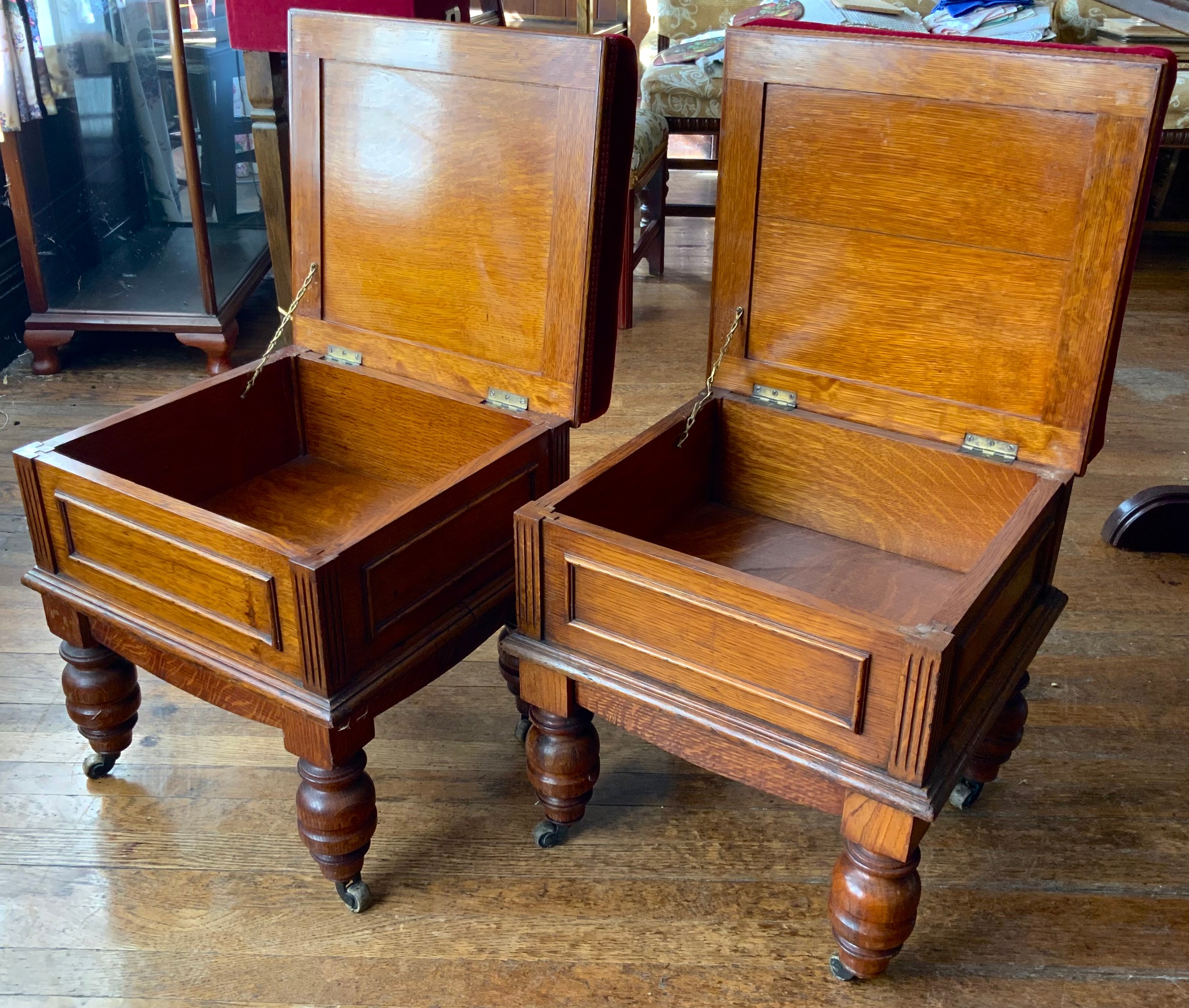 A pair of Victorian oak stools, hinged stuffed over seats, panelled sides, turned legs, on - Image 2 of 2