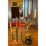 A 19th century gilt metal three light candelabrum, with three bud sconces, leafy arms and column,