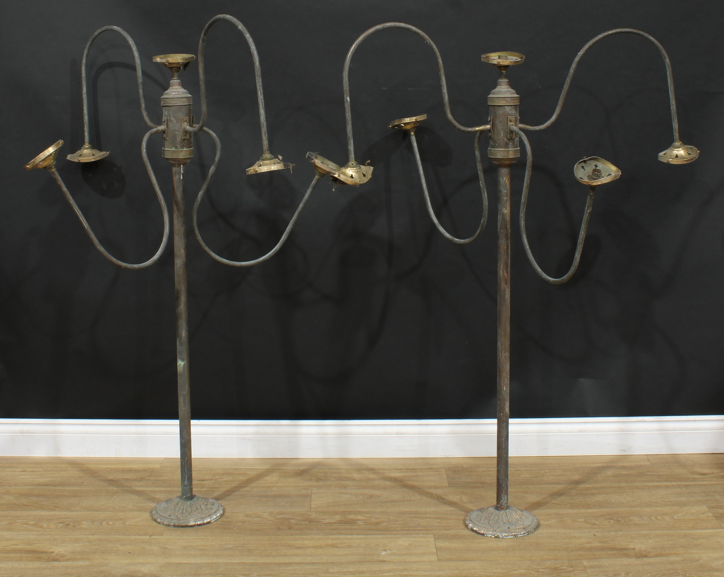 A pair of ceiling mounted five light four branch 'gasoliers', converted for electricity, 126cm