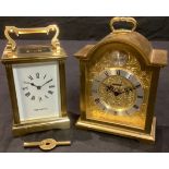 A Mappin & Webb lacquered brass, five glass carriage clock, 15cm high over swing handle; another,