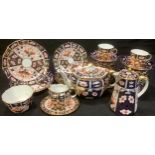 A Royal Crown Derby 2451 pattern tea service for six comprising teapot and stand, hot water pot,