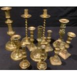 A George I/II brass candlestick, of seamed construction, c.1725; other brass candlesticks, 19th