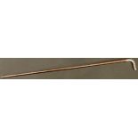 An Edwardian bamboo walking stick, the silver haft as a fluid crustacea like appendage, 90cm,