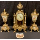 A continental gilt brass three piece clock garniture, painted dial with Arabic numerals, twin