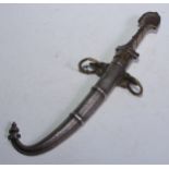 A North African/Middle Eastern silver mounted koummya or kindjal dagger, 23cm curved blade, the hilt