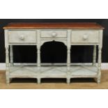 A Victorian pine and painted low pot board dresser, rectangular top above three frieze drawers, 83.