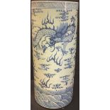 A Chinese blue and white stick stand, painted with dragons, 61cm high