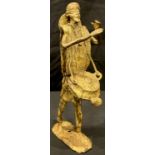 A Benin bronze figure, musician, 26cm high