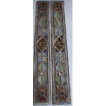 A pair of leaded stained glass panels, each 136.5cm x 18.5cm (2)