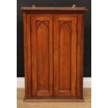 A Gothic Revival oak wall hanging spice cabinet, 93.5cm high, 65cm wide, 21cm deep