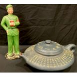 A Chinese figure Chairman Mao Tse Tung, 33cm; a Chinese terracotta teapot, 38cm wide overall (2)