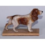 A Continental cold painted spelter model, of a cocker spaniel, rectangular marble base, 19.5cm long,