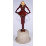 An Art Deco style spelter figure, dancing girl, white onyx plinth base, 23.5cm high