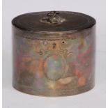 A George III silver oval tea caddy, hinged cover with flower finial, bright-cut engraved with Neo-