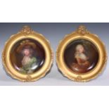 A pair of Continental circular plates, painted by Leslie Johnson, with early 18th century ladies