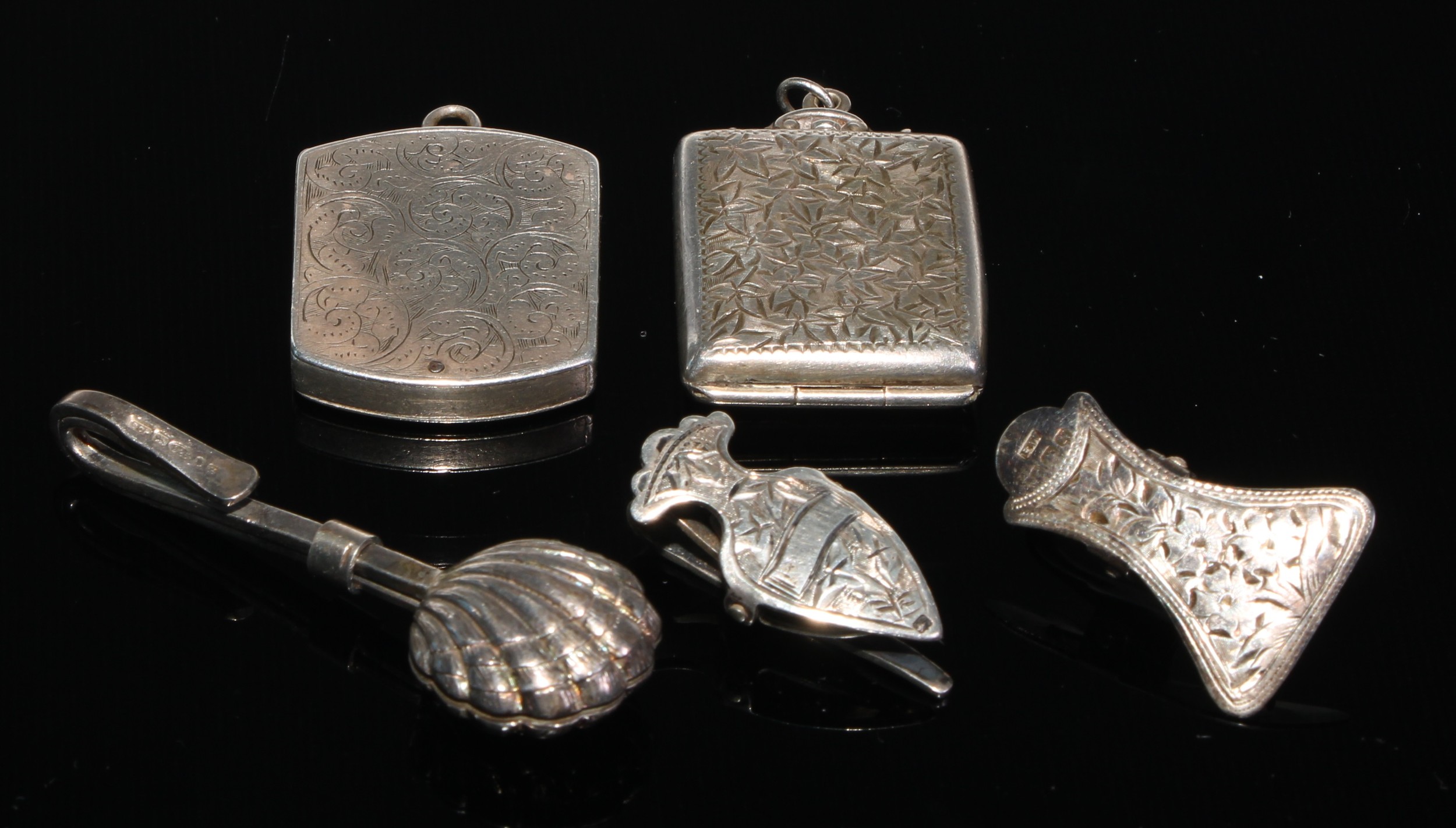 A Victorian silver stamp case, Birmingham 1886; another revolving, Chester 1901; Edwardian silver