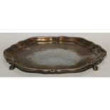 A George V silver shaped circular salver, fluted beaded border, ball and claw feet, 32cm diam,