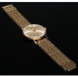 A gentleman's 9ct gold Longines wristwatch, 3.25cm champagne dial, numerals 12, 3, 6 and 9 divided