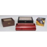 Boxes - a Breitling red marble effect watch box, outer card slip; three watch display cased, for