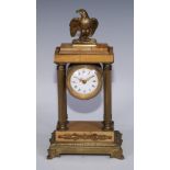 A French Empire design gilt bronze and sienna marble portico timepiece, of small proportions, 5cm