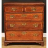 A George III oak chest, rectangular top with moulded edge above two short and three long graduated