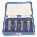 A set of four silver novelty corn-on-the-cob holders, Birmingham 1969, 122.8g, boxed