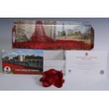 A Royal British Legion Centenary ceramic poppy by Paul Cummins made for the art installation at