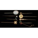A 19th century opal stick pin, yellow metal star disc mount, unmarked; others seed pearl and opal;