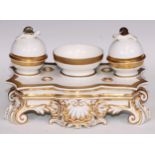 A Bloor Derby standish, circular wells with domed covers crested by bird finials, shells to apron,