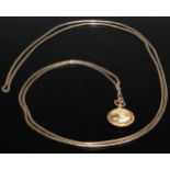 An Edwardian gold coloured metal snake link muff chain, lobster claw clasp, tests as 9ct gold,